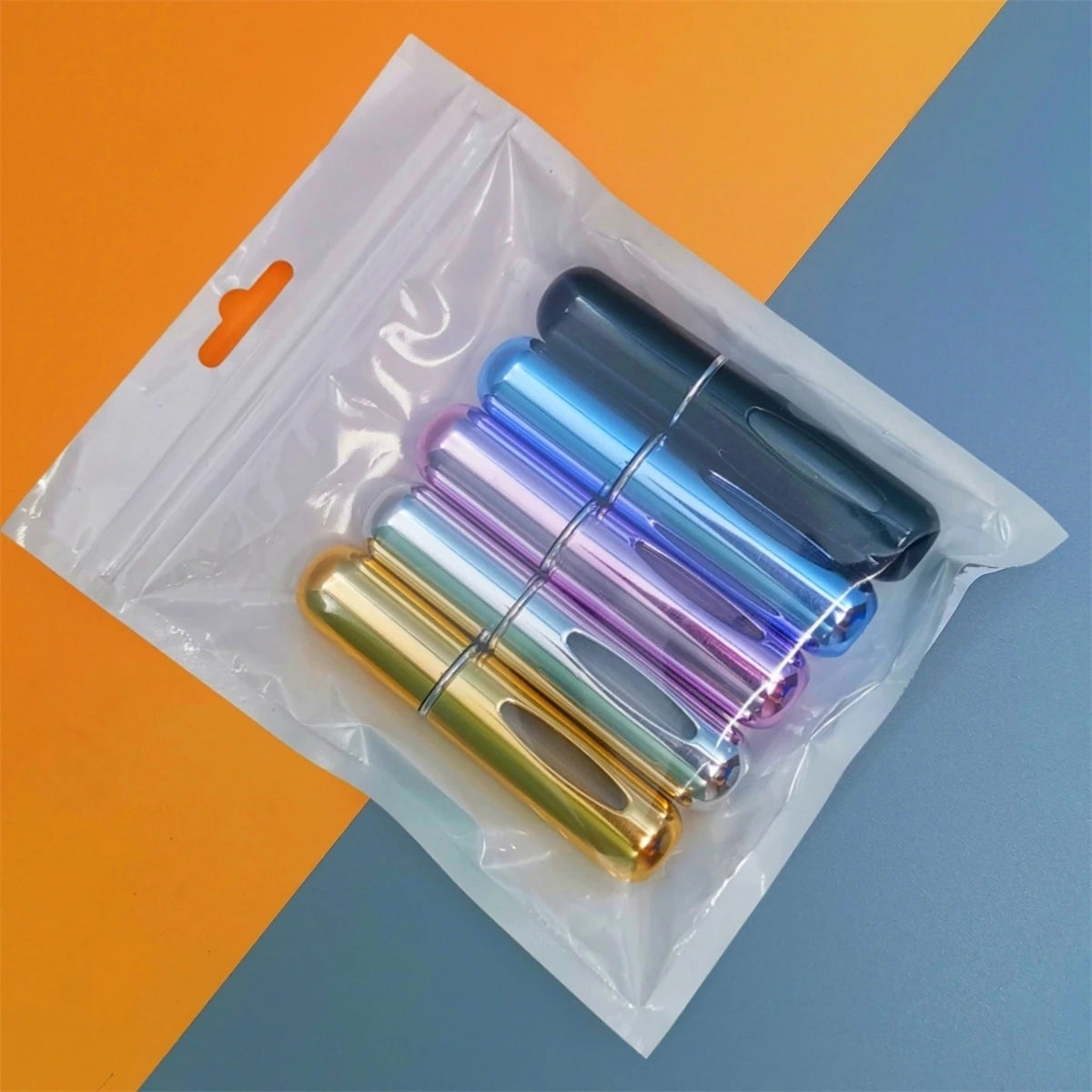 Set of colorful mini refillable perfume spray bottles 5ml in a travel pouch