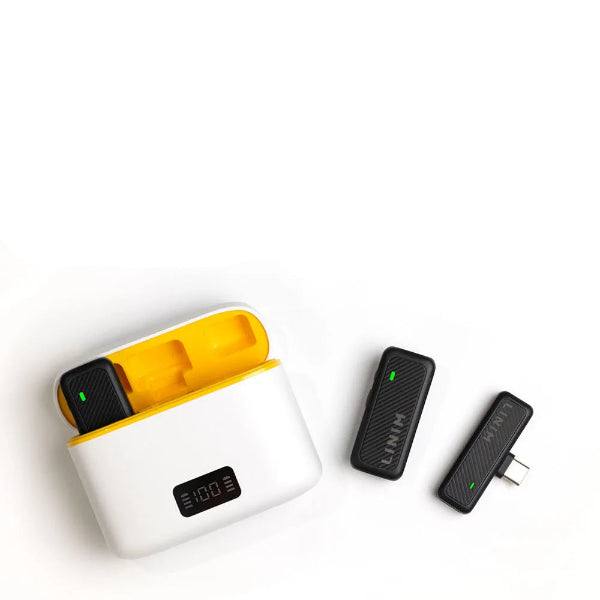 Open charging case for LINIM wireless microphones – organized storage with visible battery display